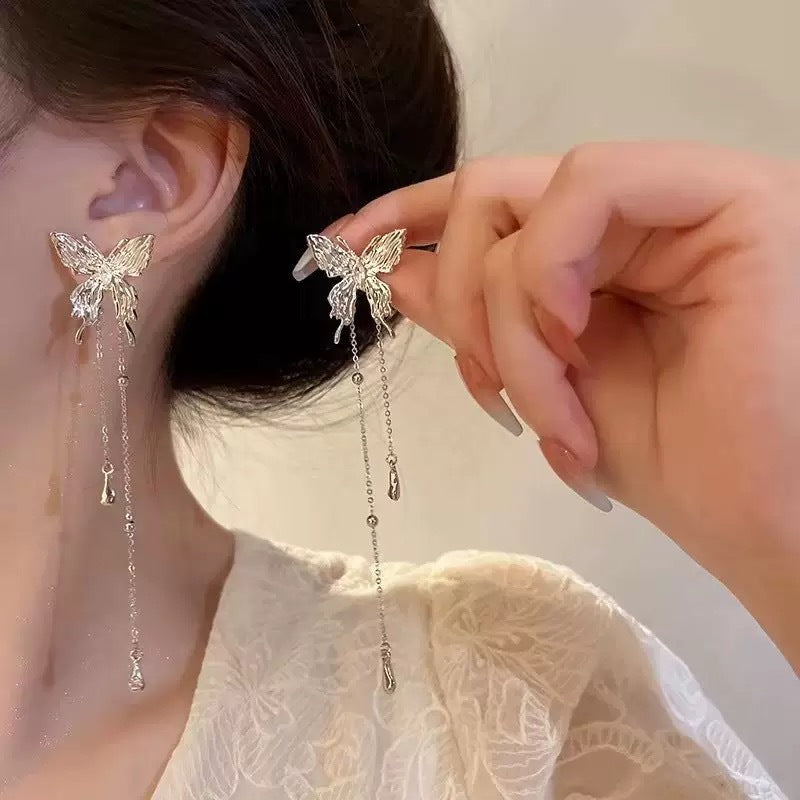 Damen Ohrringe im eleganten Schmetterlingsdesign mit funkelnden Kristallakzenten Shop Nory