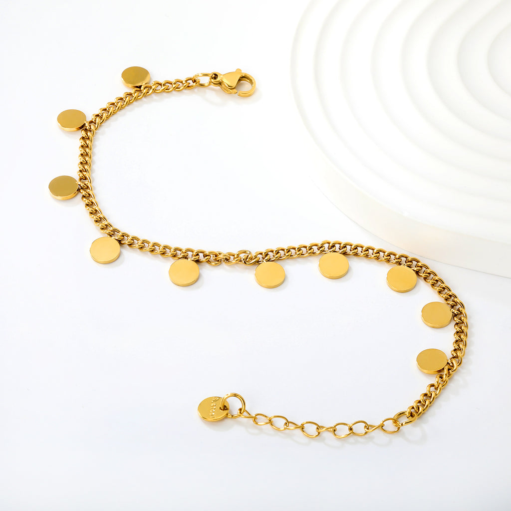 Damen stilvolles Armband mit glänzenden, runden Anhängern aus Edelstahl Shop Nory