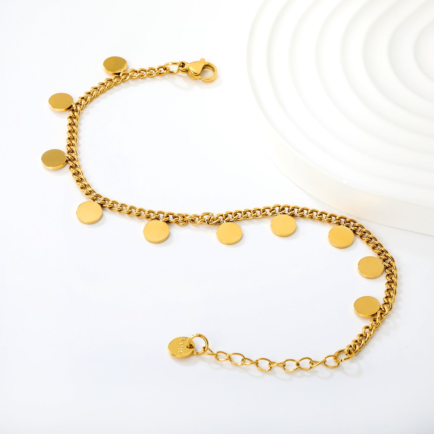 Damen stilvolles Armband mit glänzenden, runden Anhängern aus Edelstahl Shop Nory