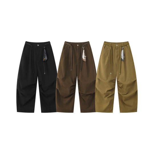 Damen Weite Culotte‑Hose mit Elastikbund, Stufenfalten und dekorativem Tuchanhänger Shop Nory