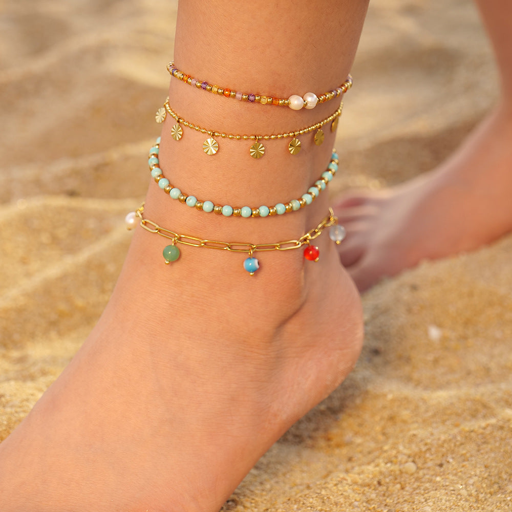 Damen Armband mit bunten Perlen und edlen Goldakzenten Shop Nory