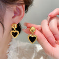 Damen Ohrringe mit elegantem Herzanhänger Shop Nory