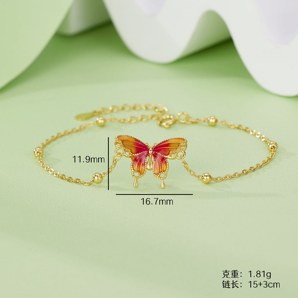 Damen Armband mit filigranem Schmetterlingsdesign und funkelnden Akzenten Shop Nory