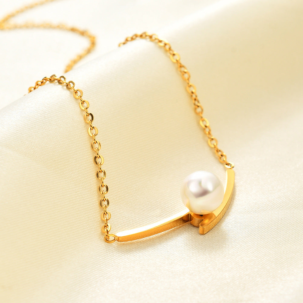 Damen Halskette mit elegantem Perlenanhänger und modernem Edelstahl-Design Shop Nory