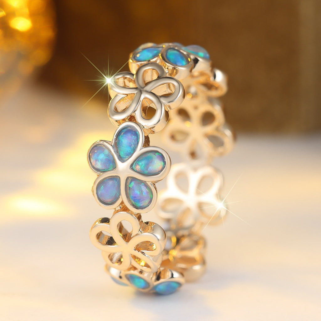 Damen Ring mit floralen, leuchtenden Opaleinsätzen Shop Nory