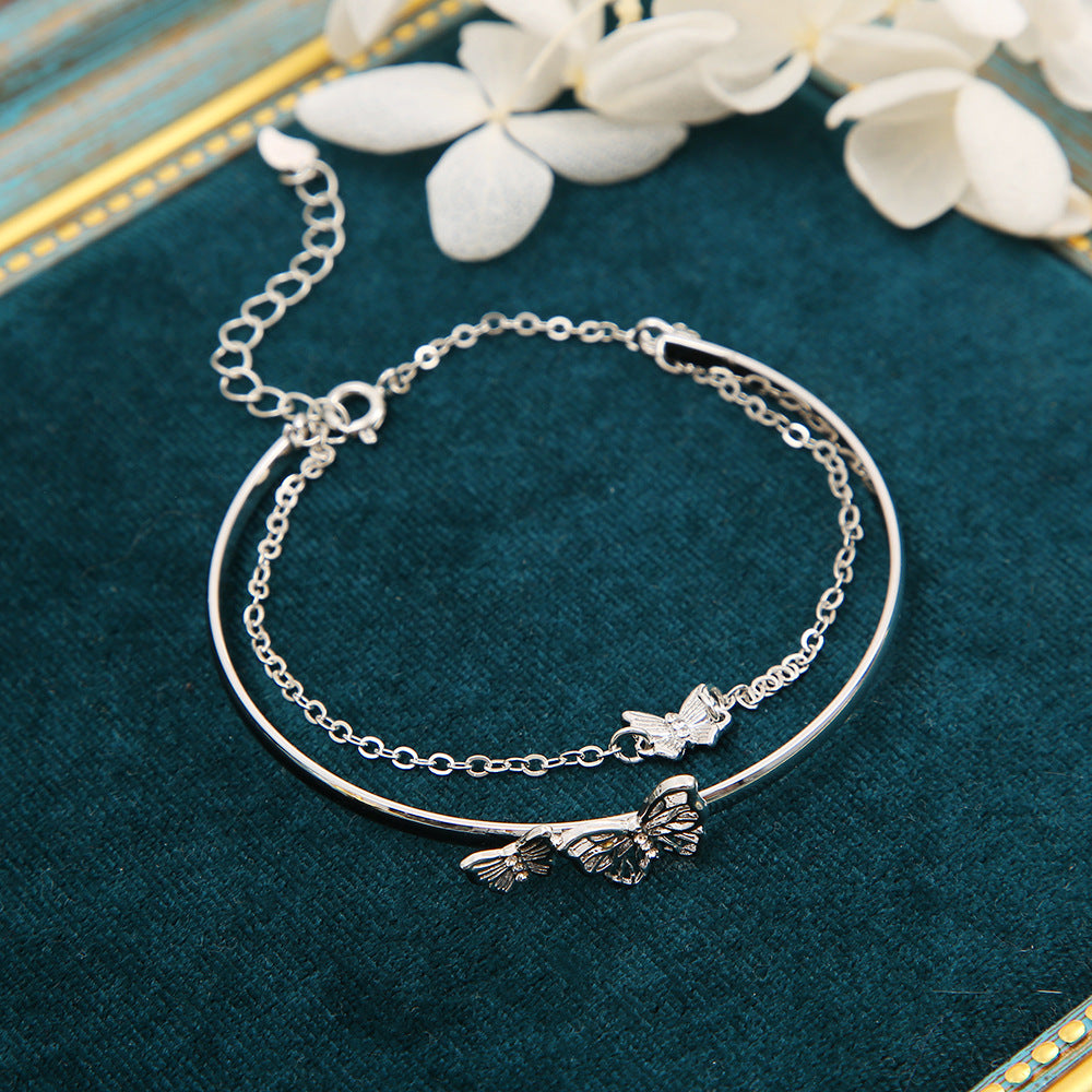 Damen-Armbänder mit verspieltem Schmetterlingsdesign und zarten Kettendetails Shop Nory