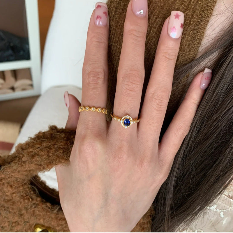 Damenring mit strahlendem blauen Edelstein und funkelnden Zirkonia Shop Nory