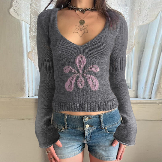 Damen nan kurzes Feinstrick V‑Pullover mit floralem Intarsienmotiv und ausgestellten Trompetenärmeln Shop Nory