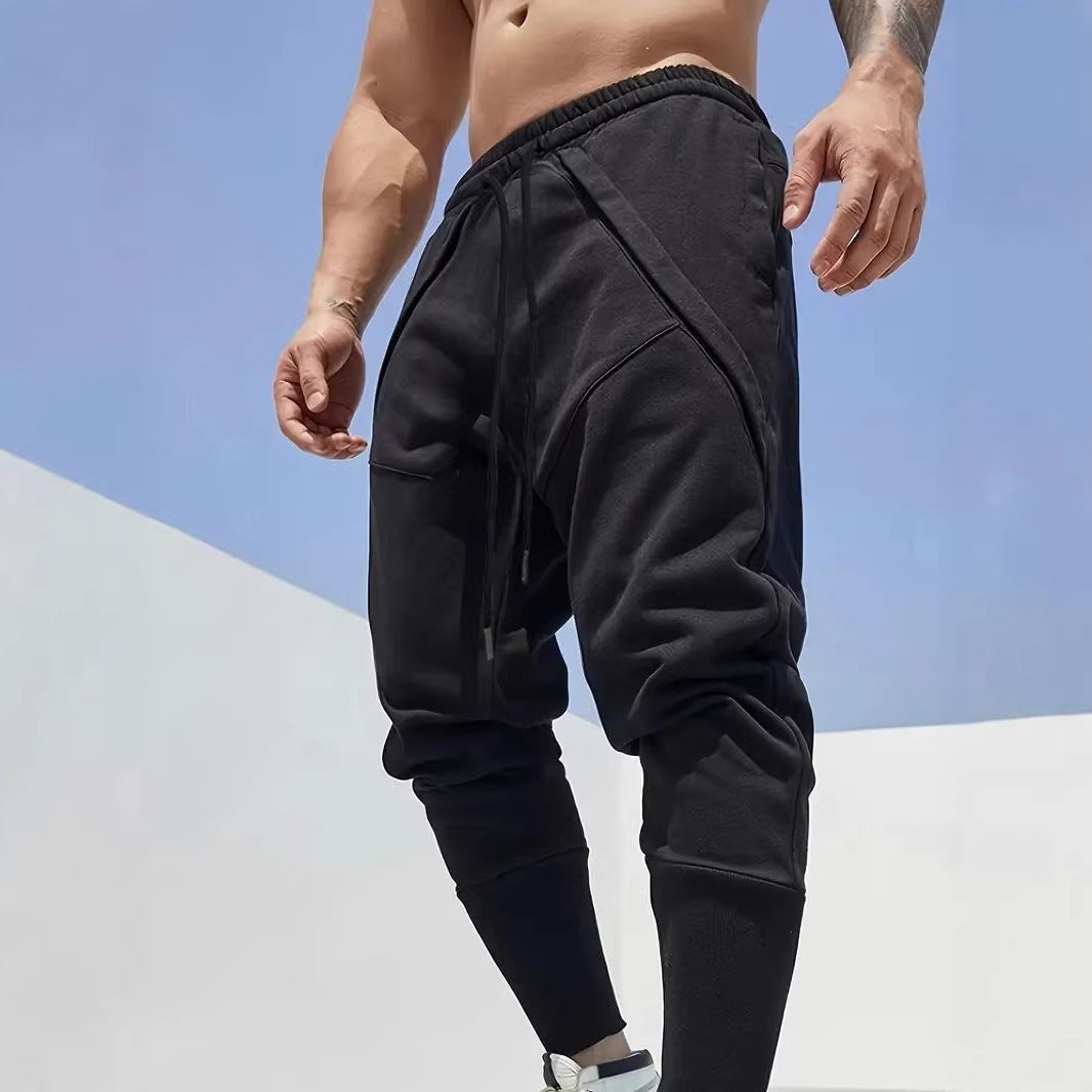 Herren Tapered-Jogginghose mit tiefem Schritt, elastischem Bund & diagonalgesetzten Taschen Shop Nory