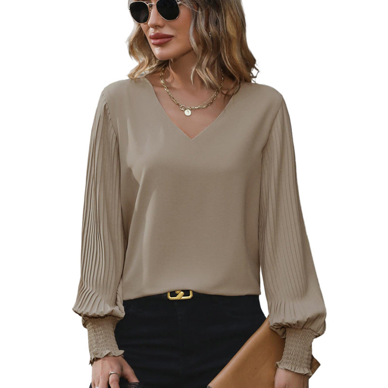 Damen Feminine V-Ausschnitt-Bluse mit plissierten Ballonärmeln und Smokmanschetten Shop Nory