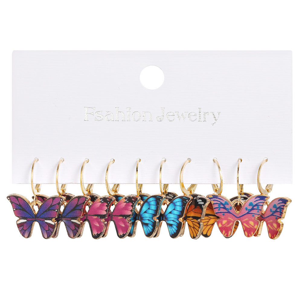Damen Ohrringe Set mit verspielten Schmetterlings- und Blumenmotiven Shop Nory