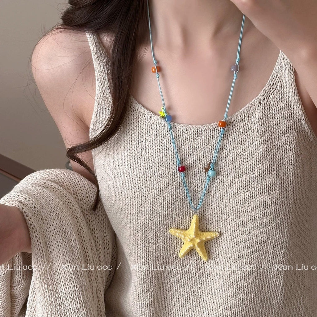 Damen Kette mit buntem Seestern-Anhänger und verspielten Perlendetails Shop Nory