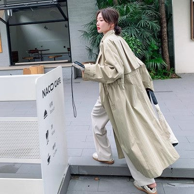 Damen Oversize-Trenchcoat mit Cape‑Rücken, Tunnelzugtaillierung und weiten Ärmeln Shop Nory