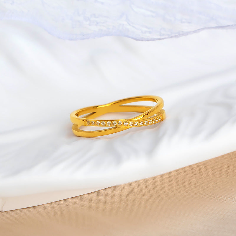 Damen eleganter Ring mit geflochtenem Design und funkelnden Zirkonia-Steinen Shop Nory