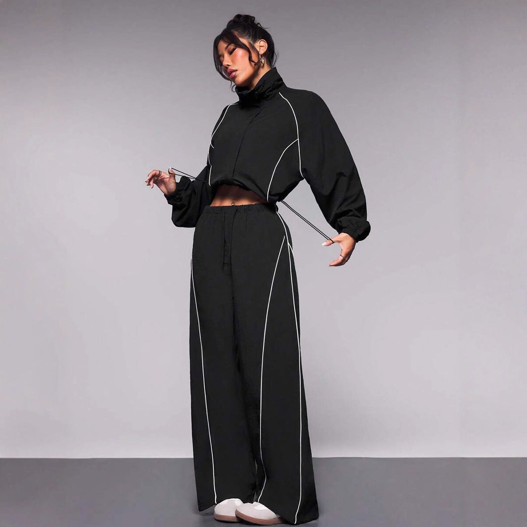 Damen sportives Cropped Windbreaker-Set mit Stehkragen Tunnelzug und reflektierenden Paspeln Shop Nory