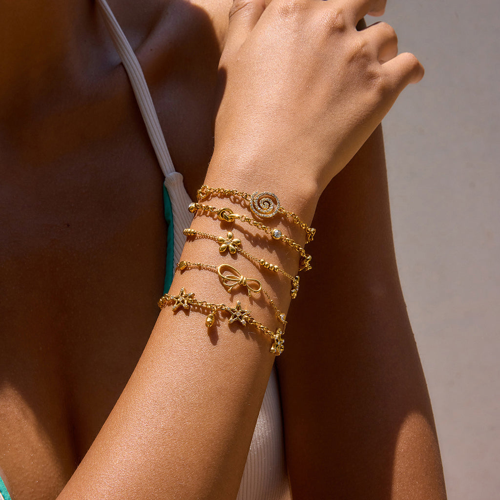 Damen Armband mit elegantem Schleifenmotiv und funkelnden Zirkonia Shop Nory