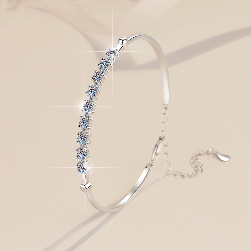 Damenarmband mit funkelnden Zirkonia-Steinen und eleganter Fassung Shop Nory