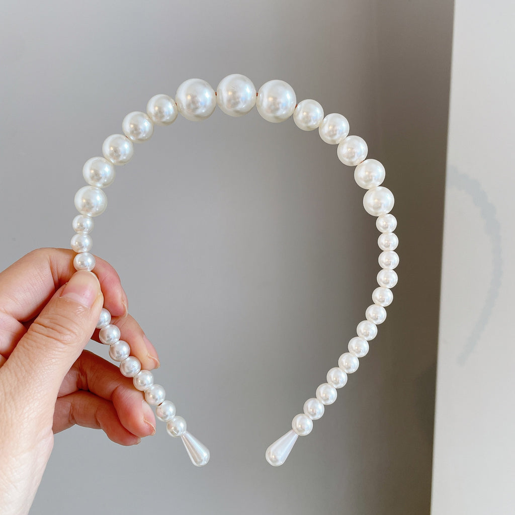 Damen Haarband mit eleganten Perlenakzenten Shop Nory