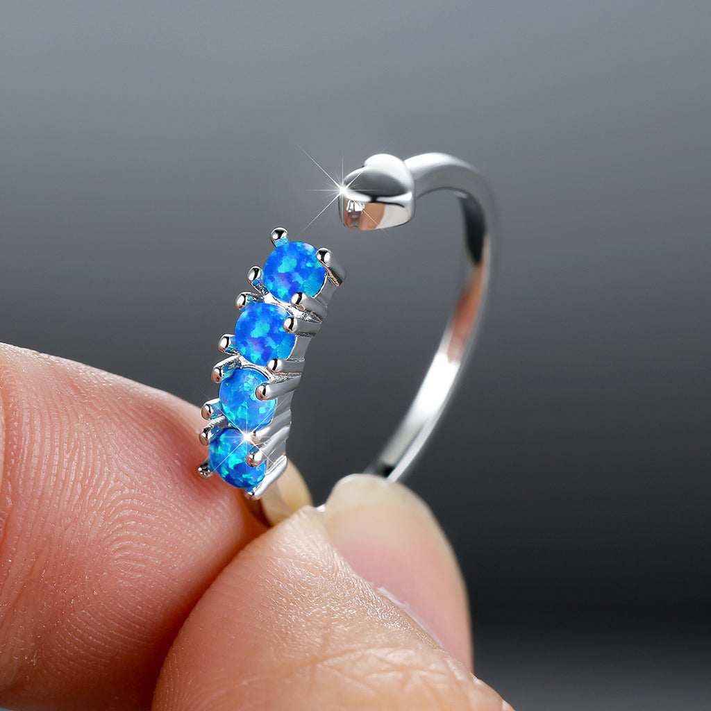 Damen Ring mit leuchtenden Opalsteinen Shop Nory