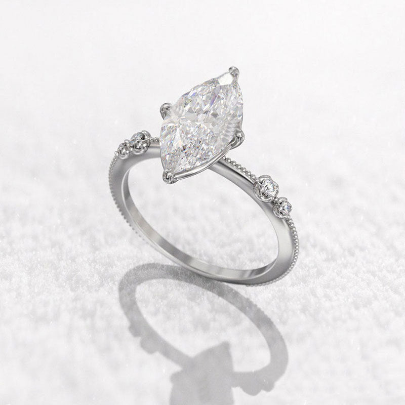Damen Eleganter Ring mit marquise-förmigem Stein und funkelnden Akzenten Shop Nory