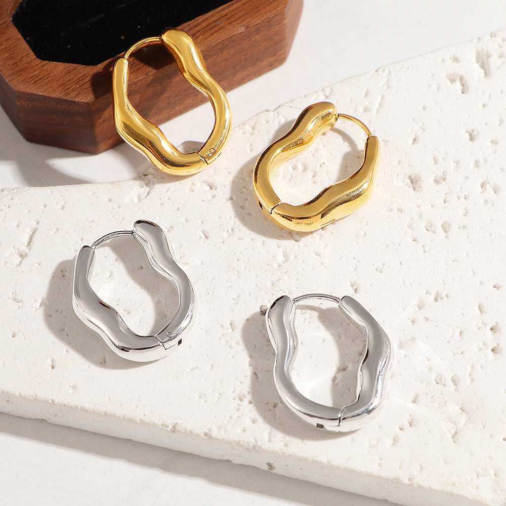 Damen moderne Creolen mit elegant geschwungenem Design Shop Nory