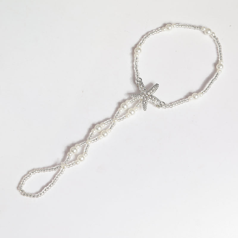 Zierliches Fußkettchen mit Zehenring und Seestern-Anhänger