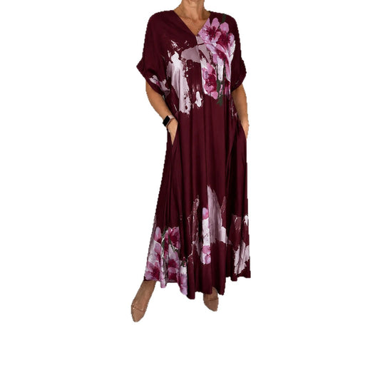 Damen Maxikleid mit weitem Fall, V-Ausschnitt, Eingrifftaschen und floraler Aquarelloptik Shop Nory