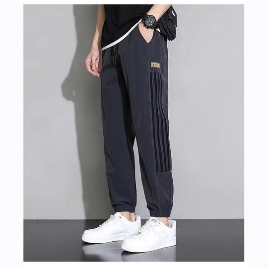 Damen Sportliche Trainingshose mit seitlichen Streifen Shop Nory