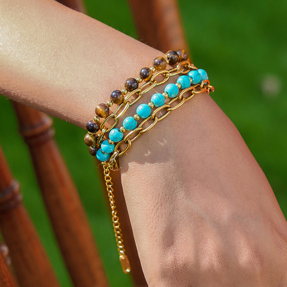 Damen Armband mit goldfarbener Edelstahlkette und charmanten Steinakzenten Shop Nory