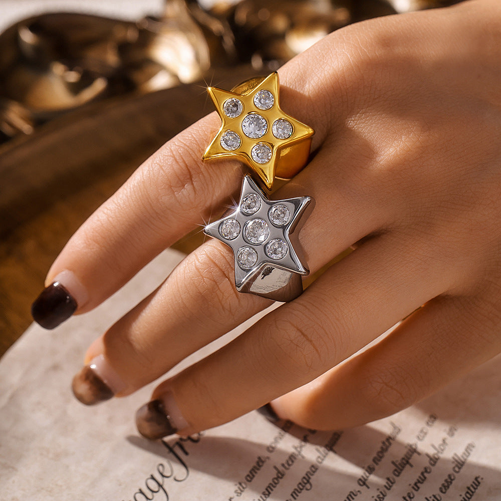 Damen sternförmiger Ring aus Titan mit Zirkonen Shop Nory