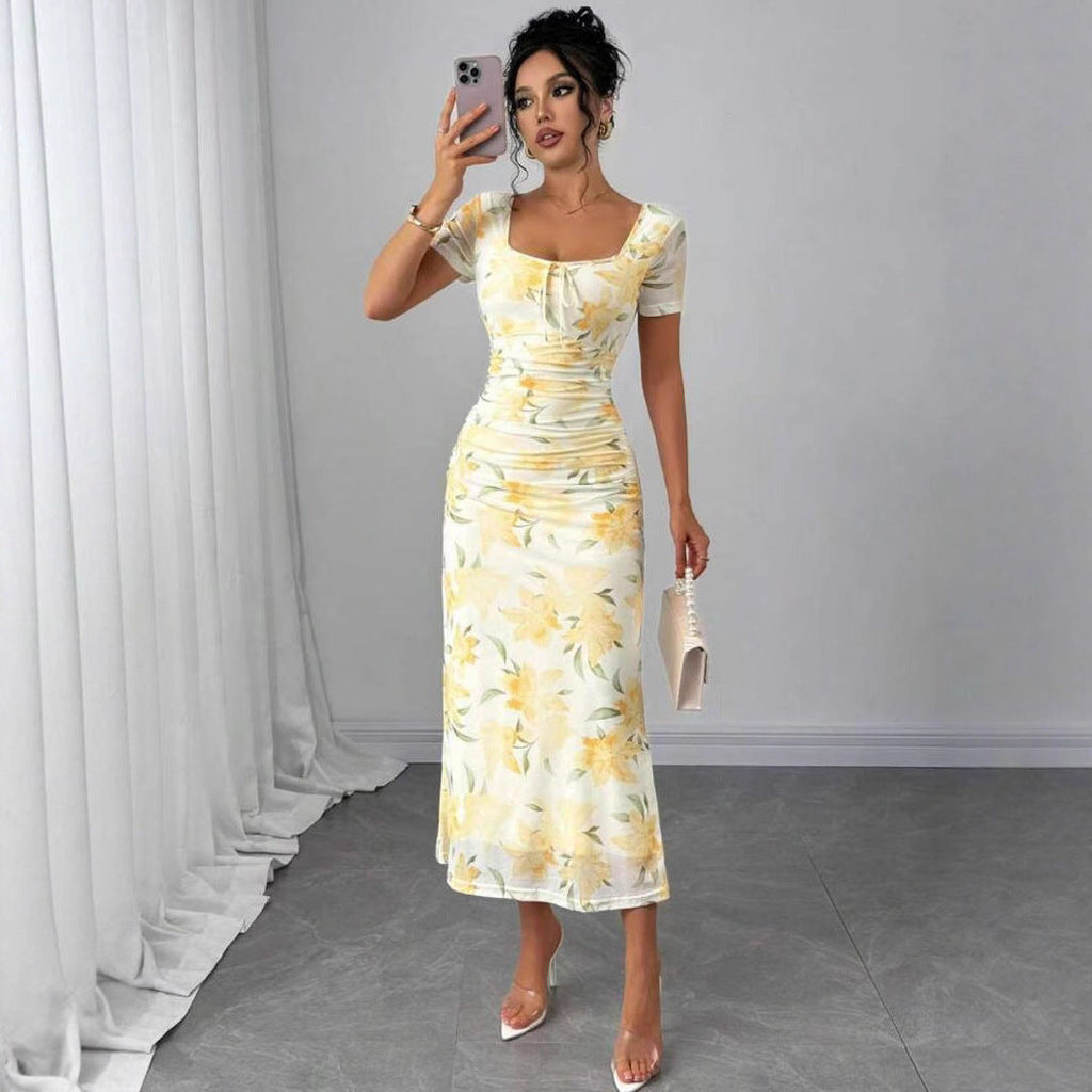 Damen Midi-Kleid mit raffinierten Falten und floralem Muster