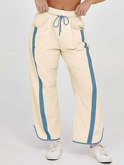 Damen nan relaxte Trackpants mit seitlichem Kontraststreifen, elastischem Smokbund und Eingrifftaschen Shop Nory