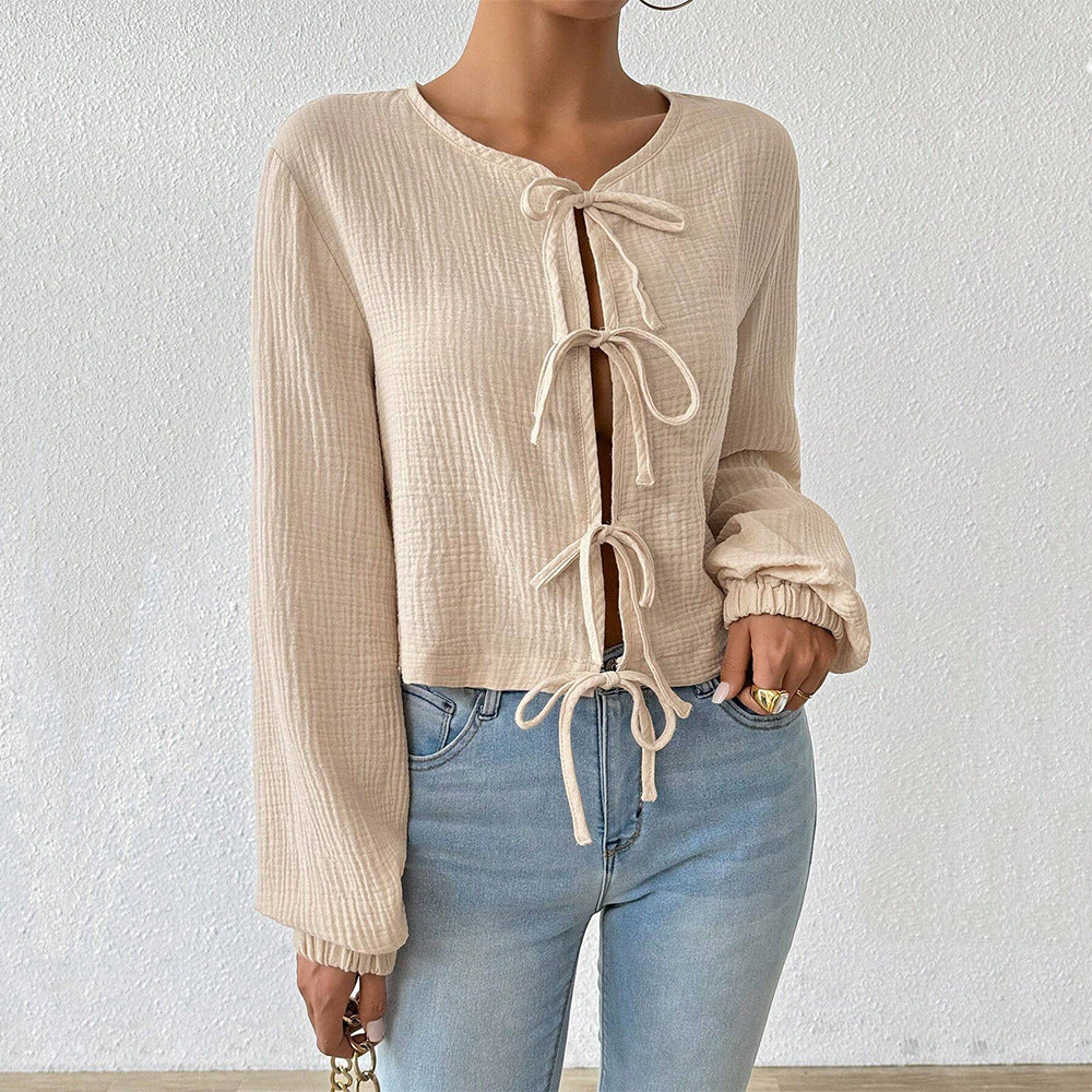 Damen kurz geschnittene Musselinbluse mit Knotenverschlüssen und Ballonärmeln Shop Nory