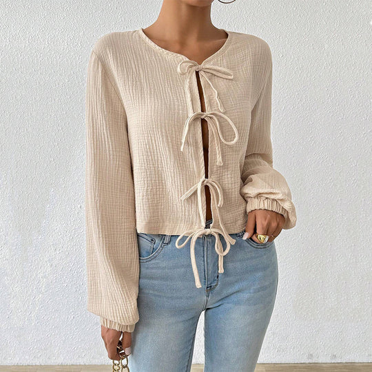 Damen kurz geschnittene Musselinbluse mit Knotenverschlüssen und Ballonärmeln Shop Nory