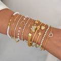 Damen Armband-Set mit funkelnden Kristallen und reizvollen Herzanhängern Shop Nory