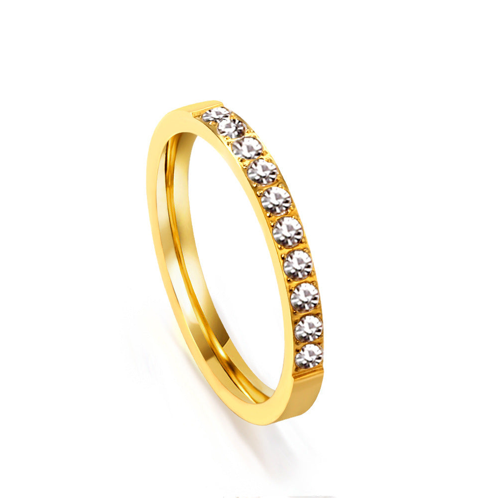 Damen Ring mit funkelnden Zirkonia und goldfarbener Beschichtung Shop Nory
