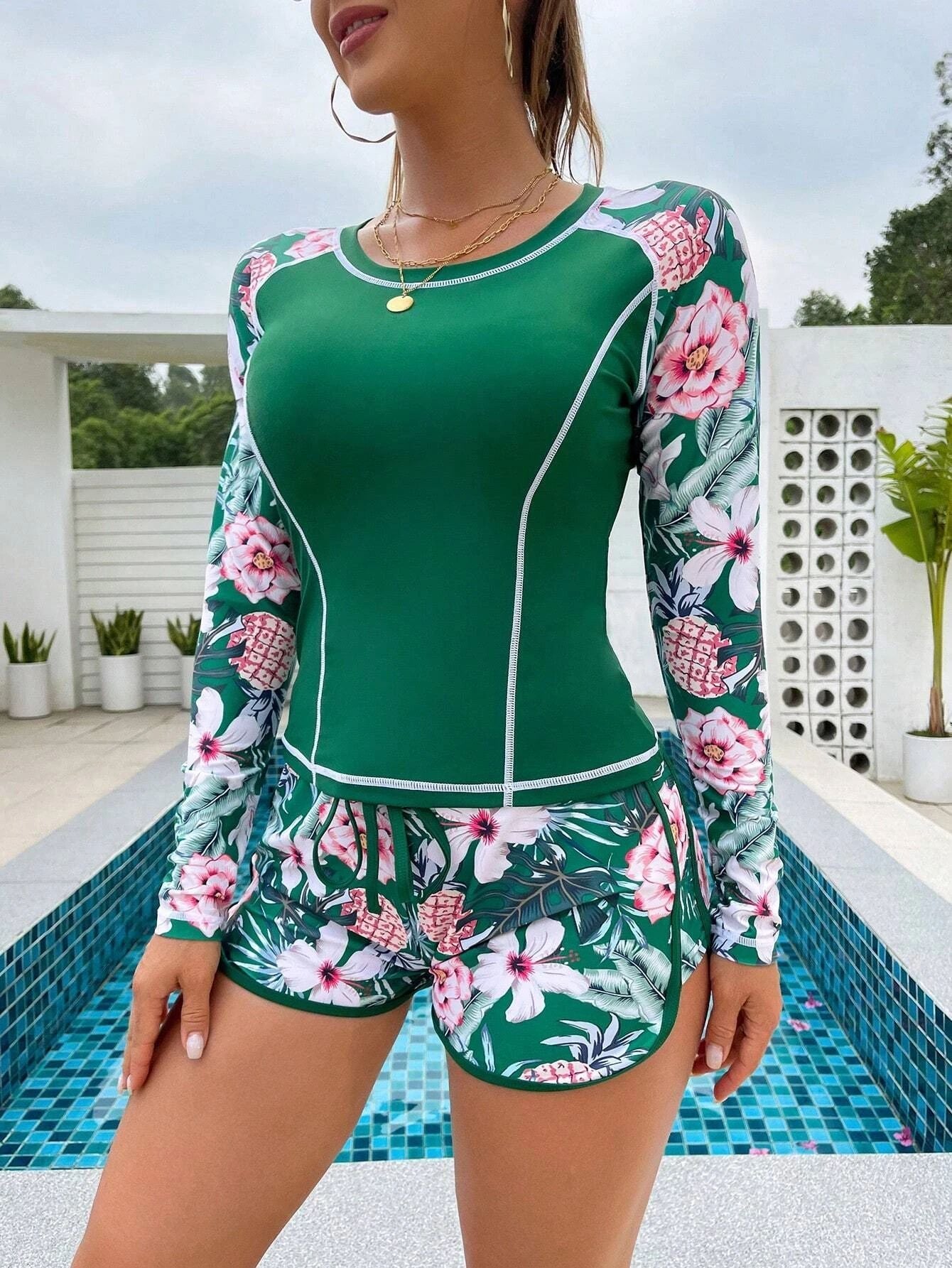 Damen Langarm Surf-Badeanzug mit floralem Muster