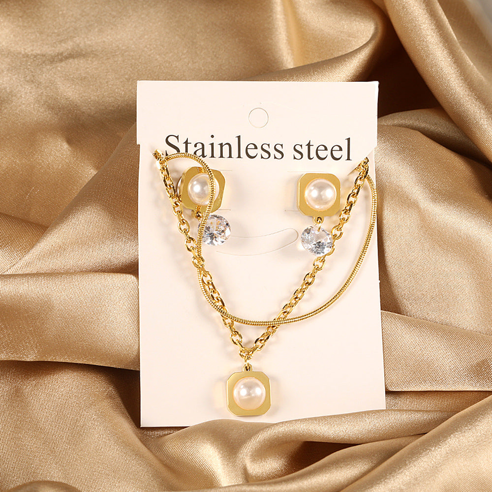 Damen Schmuckset mit modernem, eleganten Perlenanhänger und Ohrringen Shop Nory