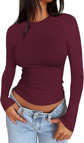 Damen Körpernahes Langarmshirt im Cropped-Look mit verlängerten Ärmeln und Daumenloch Shop Nory