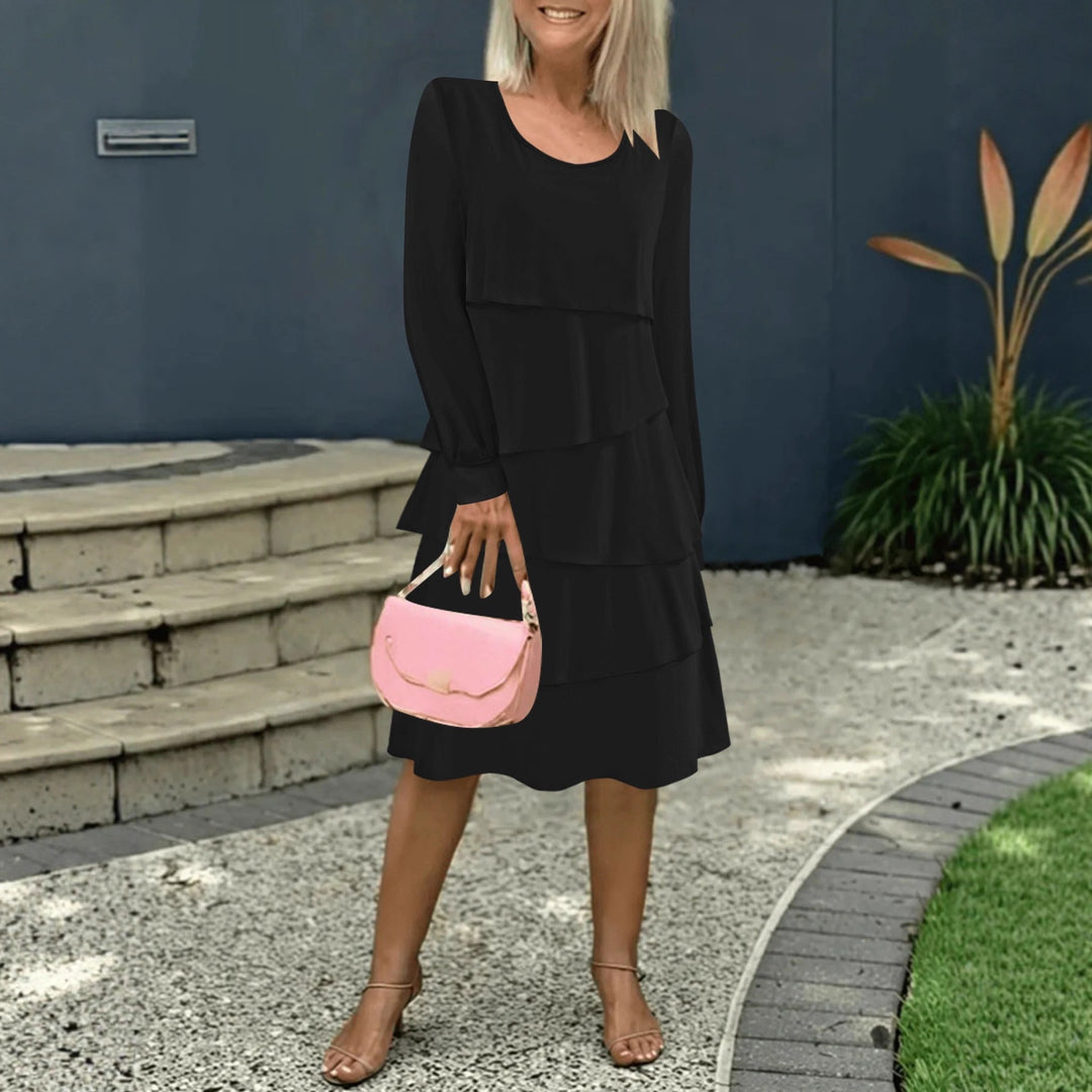 Damen Stufenkleid mit Lagenrock, Rundhalsausschnitt und Ballonärmeln Shop Nory