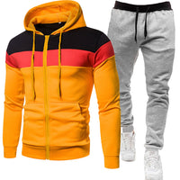 Hellgraue Hose mit Orange und schwarzem Bund