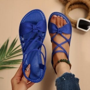 Damen Zarte Römersandalen mit Schleifen-Detail und verstellbaren Schnürriemen Shop Nory