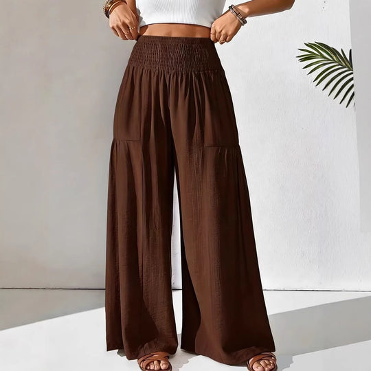 Damen weite Palazzo-Hose mit gerafftem Smock-Bund und Stufendetails Shop Nory