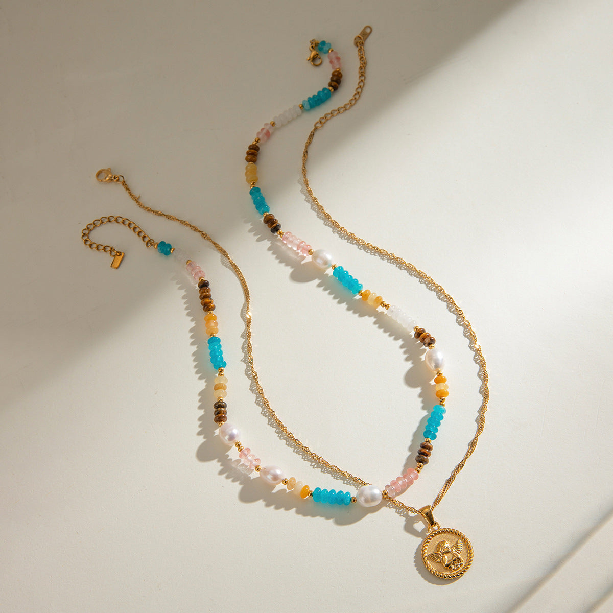 Damen Halskette mit kunstvollem Engel-Anhänger aus hochwertigem Edelstahl Shop Nory