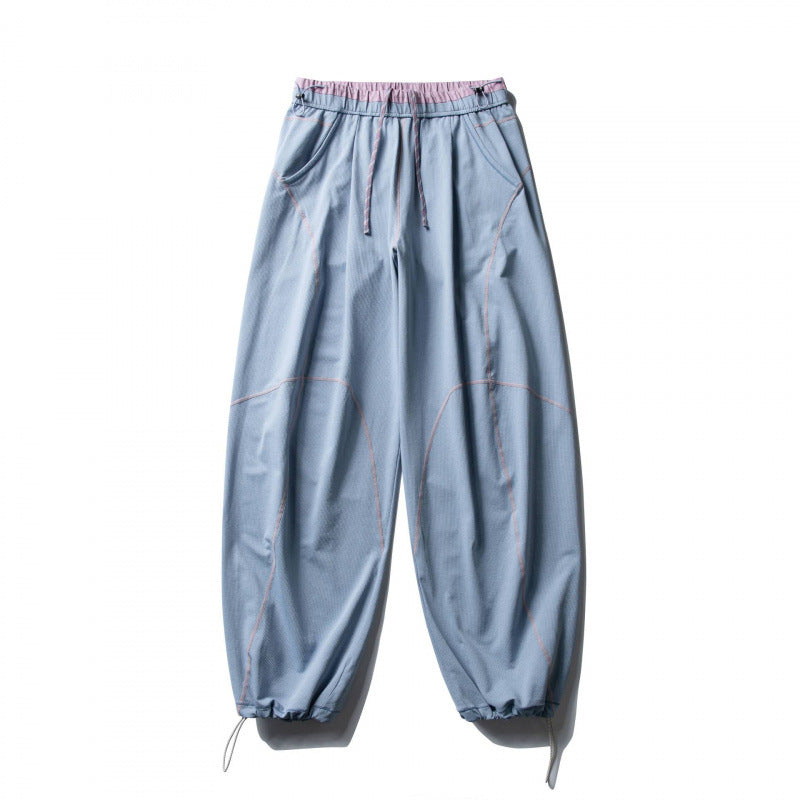 Unisex Locker geschnittene Tech-Jogginghose mit elastischem Bund, markanten Flatlock-Nähten und Kordelzug Shop Nory