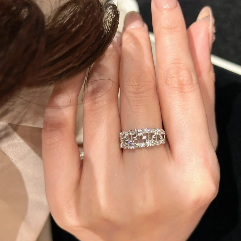 Damen Designer Ring mit filigranem Gittermuster und funkelnden Zirkonia Shop Nory