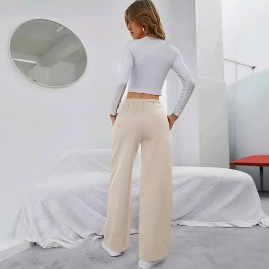 Damen nan High‑Waist Wide‑Leg Jogginghose mit elastischem Komfortbund, Kordelzug und tiefen Eingrifftaschen Shop Nory