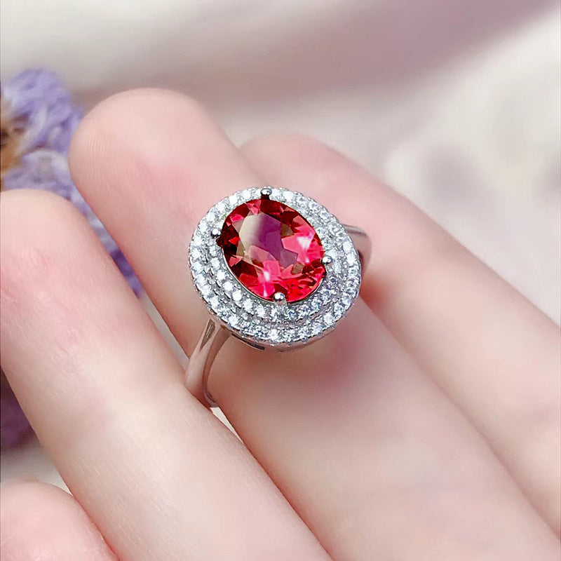 Damen Zierlicher Ring mit ovalem, strahlendem Edelstein und funkelndem Zirkonia-Besatz Shop Nory