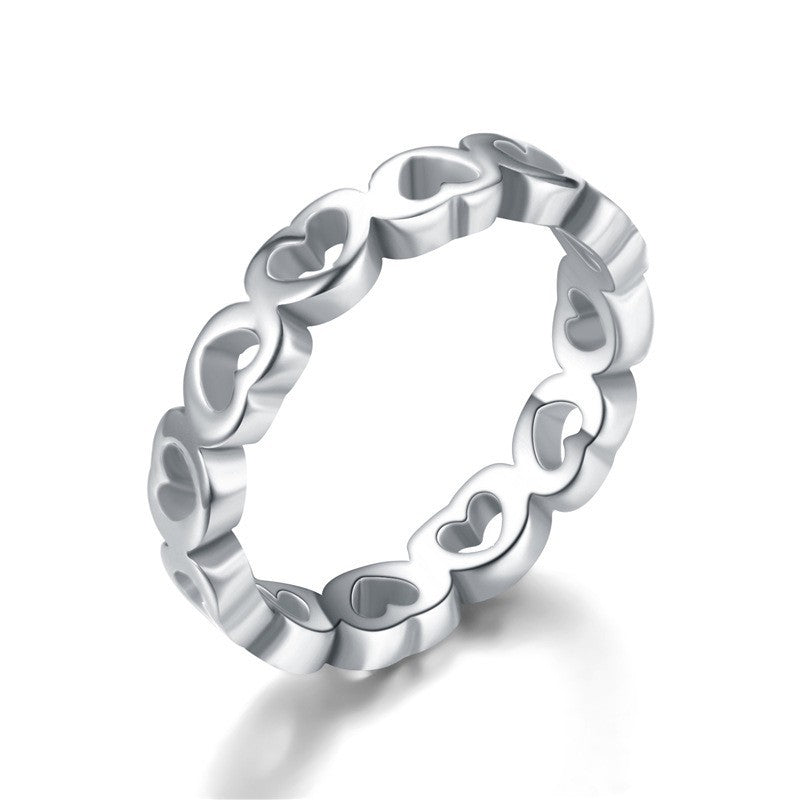 Damen Ring mit herzförmigem Design und funkelnder Oberflächenstruktur Shop Nory