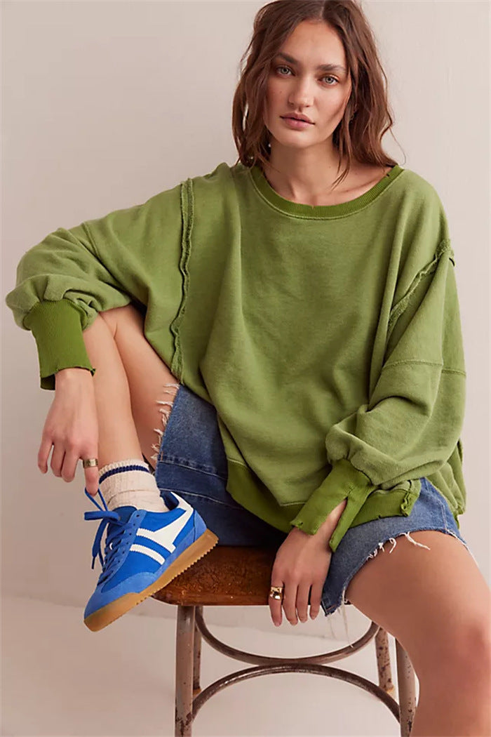 Damen oversized Sweatshirt mit Ballonärmeln, offenen Saumnähten und seitlichen Schlitzen Shop Nory
